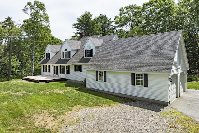 35 Rice Rd, Boothbay, ME 04544 - new england style home featuring driveway, a deck, a garage, roof with shingles, and a front yard