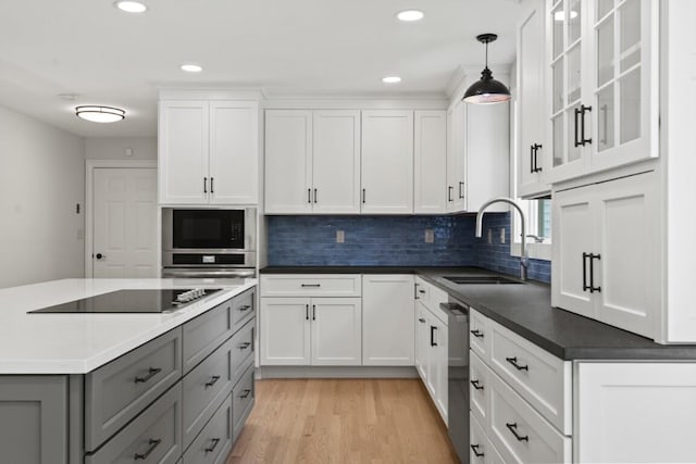 35 Rice Rd, Boothbay, ME 04544 - kitchen with black appliances, gray cabinets, white cabinetry, light wood-style floors, and recessed lighting