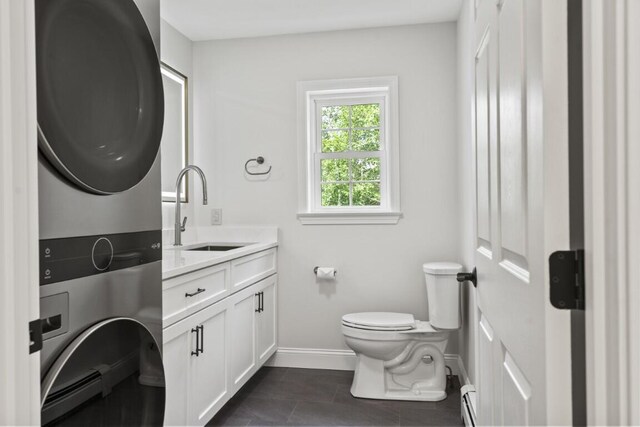35 Rice Rd, Boothbay, ME 04544 - bathroom with stacked washer and clothes dryer and double vanity