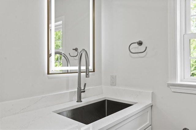 35 Rice Rd, Boothbay, ME 04544 - detailed view of a sink and white cabinetry
