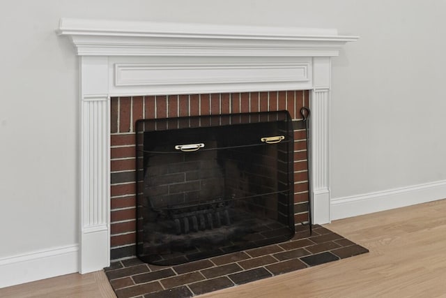 35 Rice Rd, Boothbay, ME 04544 - detailed view of a fireplace and wood finished floors