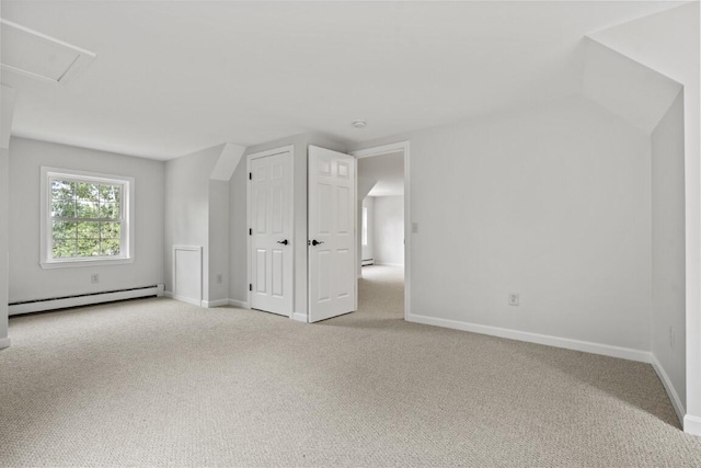 35 Rice Rd, Boothbay, ME 04544 - additional living space with a baseboard heating unit and light carpet