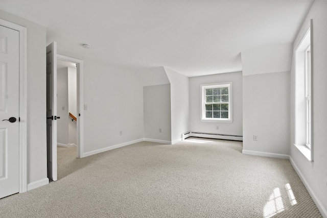 35 Rice Rd, Boothbay, ME 04544 - carpeted empty room featuring a baseboard heating unit and baseboards