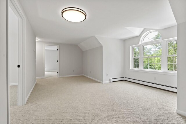 35 Rice Rd, Boothbay, ME 04544 - bonus room with a baseboard radiator, vaulted ceiling, and carpet