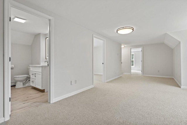 35 Rice Rd, Boothbay, ME 04544 - bonus room featuring light colored carpet, lofted ceiling, and a baseboard heating unit