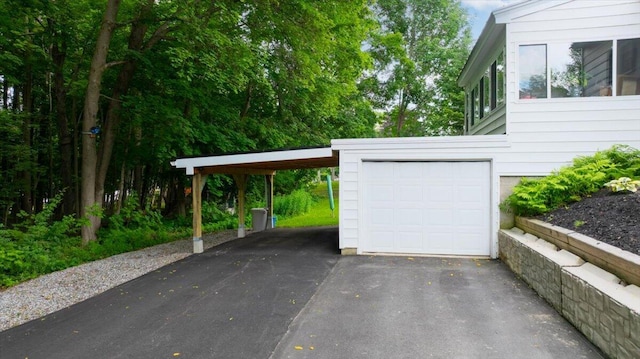 278 S Main St, Auburn, ME 04210 - garage featuring asphalt driveway