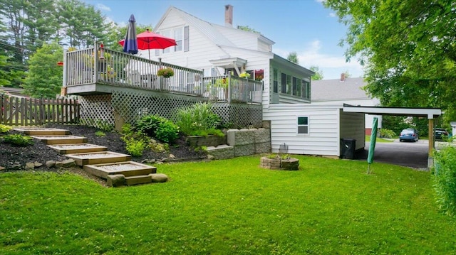 278 S Main St, Auburn, ME 04210 - back of property featuring a carport, a yard, a wooden deck, a chimney, and stairway