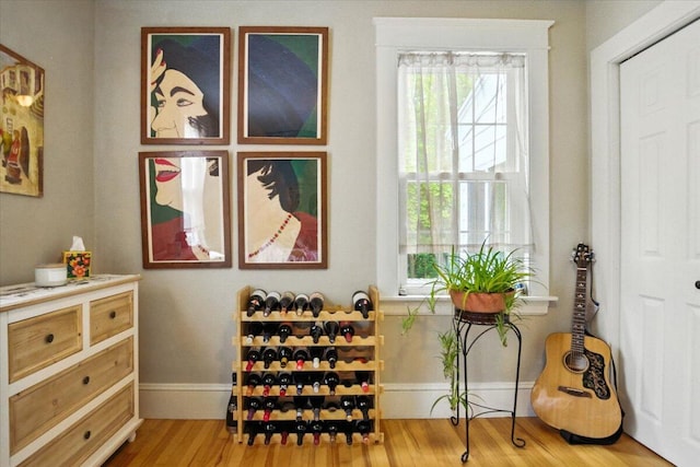278 S Main St, Auburn, ME 04210 - wine area with healthy amount of natural light and wood finished floors