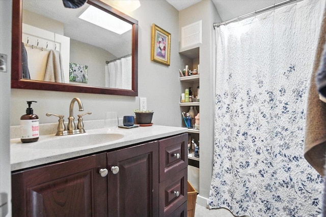 278 S Main St, Auburn, ME 04210 - bathroom with vanity and a shower with shower curtain