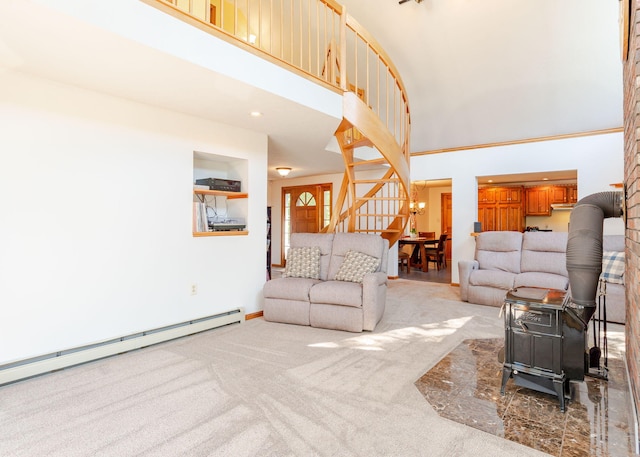 103 Hardscrabble Rd, Hollis, ME 04042 - carpeted living room with a towering ceiling, baseboard heating, and stairs