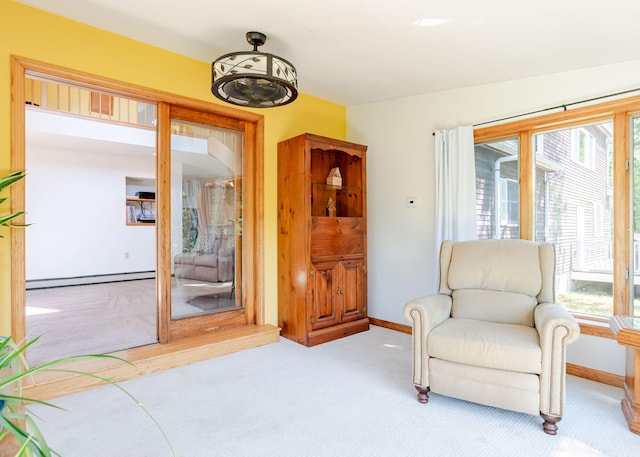 103 Hardscrabble Rd, Hollis, ME 04042 - sitting room featuring a baseboard radiator, carpet, and plenty of natural light