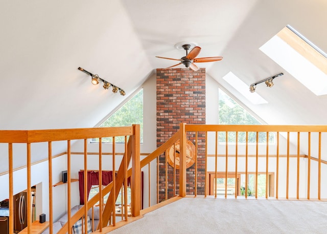 103 Hardscrabble Rd, Hollis, ME 04042 - corridor featuring track lighting, a skylight, vaulted ceiling, and healthy amount of natural light
