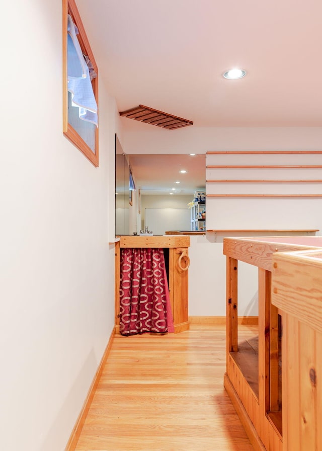 103 Hardscrabble Rd, Hollis, ME 04042 - hall with wood finished floors and recessed lighting