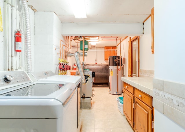 103 Hardscrabble Rd, Hollis, ME 04042 - washroom featuring water heater, independent washer and dryer, and cabinet space