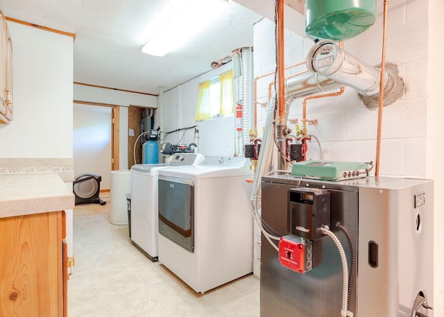 103 Hardscrabble Rd, Hollis, ME 04042 - laundry room featuring washing machine and dryer and a heating unit