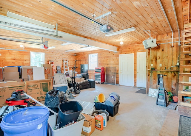 103 Hardscrabble Rd, Hollis, ME 04042 - garage with a garage door opener and wooden walls