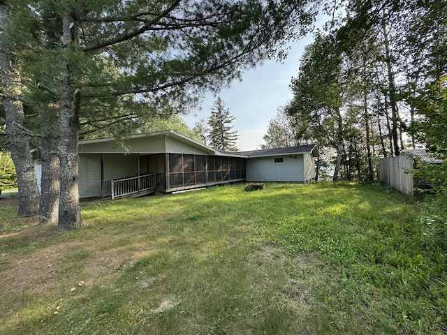 157 Cyr Rd, Cross Lake Twp, ME 04779 - view of yard featuring a sunroom