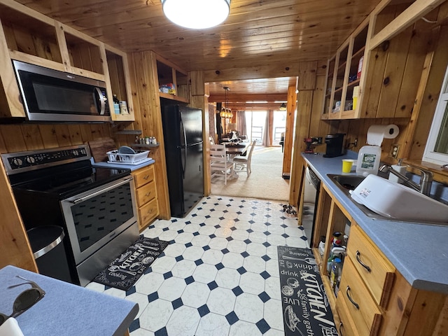 157 Cyr Rd, Cross Lake Twp, ME 04779 - kitchen with appliances with stainless steel finishes, wooden walls, wooden ceiling, light flooring, and open shelves