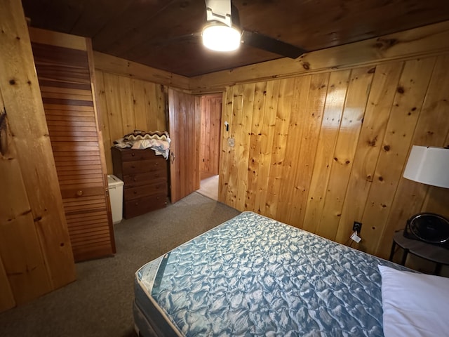 157 Cyr Rd, Cross Lake Twp, ME 04779 - bedroom featuring carpet floors, wood walls, and ceiling fan