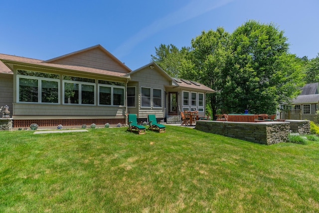 250 Mere Point Rd, Brunswick, ME 04011 - back of property featuring a lawn and a patio area