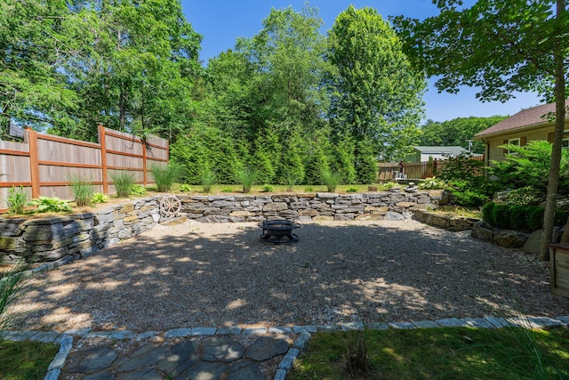 250 Mere Point Rd, Brunswick, ME 04011 - view of yard featuring a fire pit and a patio area