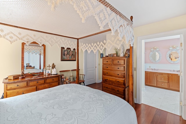 250 Mere Point Rd, Brunswick, ME 04011 - bedroom featuring wood finished floors and ensuite bath
