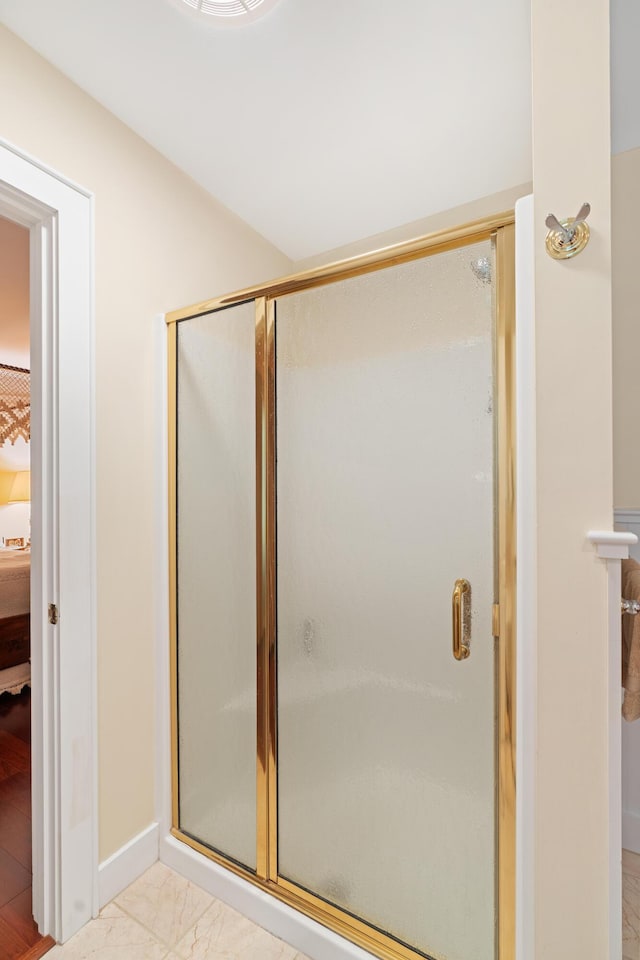 250 Mere Point Rd, Brunswick, ME 04011 - ensuite bathroom with a stall shower and marble finish floors