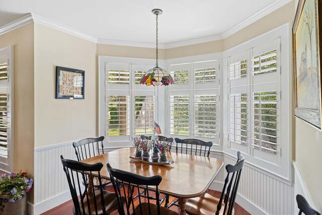 250 Mere Point Rd, Brunswick, ME 04011 - dining area featuring a wainscoted wall, crown molding, dark wood finished floors, and a decorative wall
