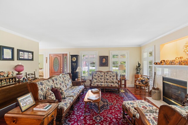 250 Mere Point Rd, Brunswick, ME 04011 - living room with ornamental molding, wood finished floors, and a fireplace