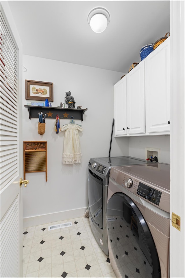 250 Mere Point Rd, Brunswick, ME 04011 - laundry room with cabinet space and washer and dryer