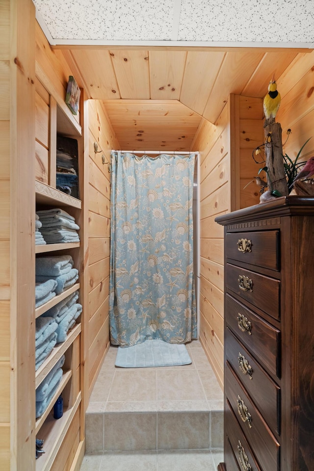 250 Mere Point Rd, Brunswick, ME 04011 - full bathroom featuring wooden walls, wooden ceiling, a shower with curtain, and tile patterned flooring