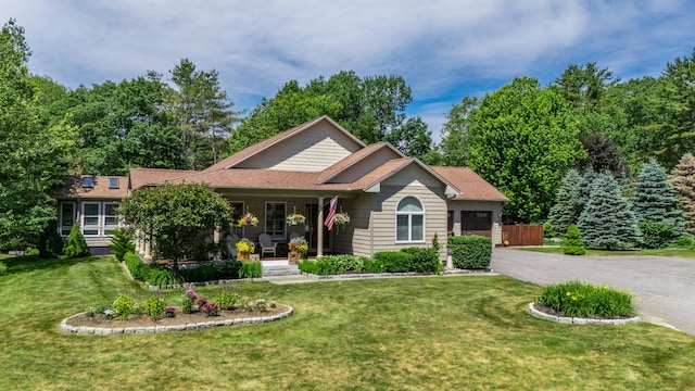250 Mere Point Rd, Brunswick, ME 04011 - ranch-style home featuring a garage, a porch, and asphalt driveway