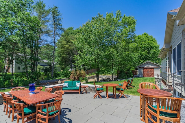 250 Mere Point Rd, Brunswick, ME 04011 - view of patio / terrace featuring outdoor dining area, an outdoor hangout area, and a shed