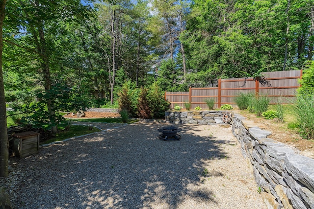 250 Mere Point Rd, Brunswick, ME 04011 - view of yard featuring an outdoor fire pit