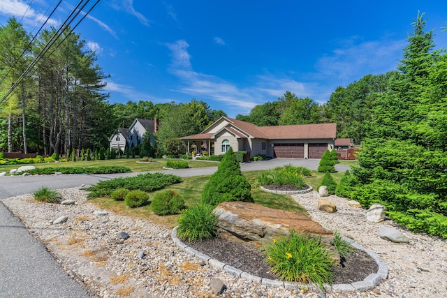 250 Mere Point Rd, Brunswick, ME 04011 - single story home featuring curved driveway and an attached garage