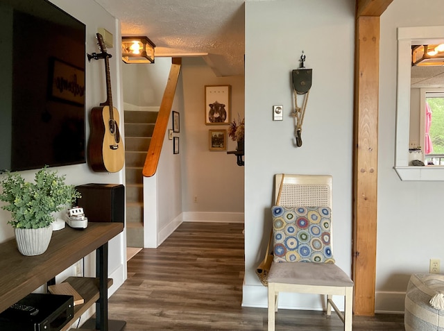 10 Aegis Dr Unit B, Bath, ME 04530 - corridor with dark wood-style floors, a textured ceiling, and stairs