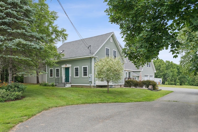 3729 Union St, Levant, ME 04456 - view of front facade with roof with shingles and a front yard