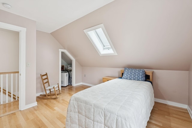 3729 Union St, Levant, ME 04456 - bedroom featuring a skylight, wood finished floors, and lofted ceiling