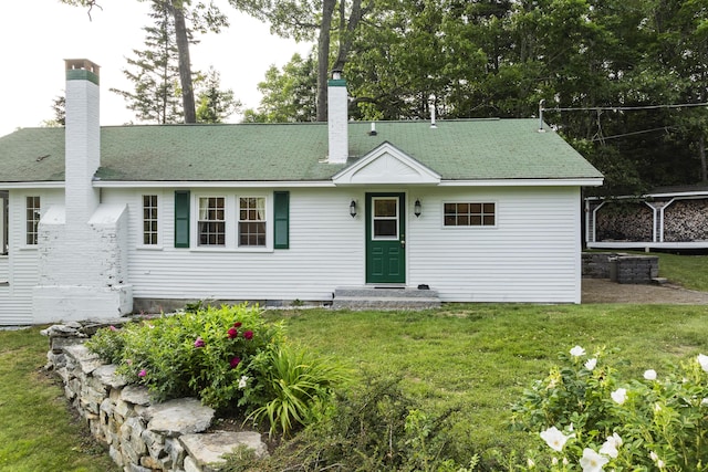 28 Will Alley Rd, South Bristol, ME 04568 - view of front of property with a chimney and a front yard