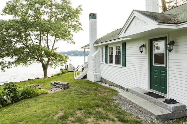 28 Will Alley Rd, South Bristol, ME 04568 - doorway to property with a chimney and a lawn