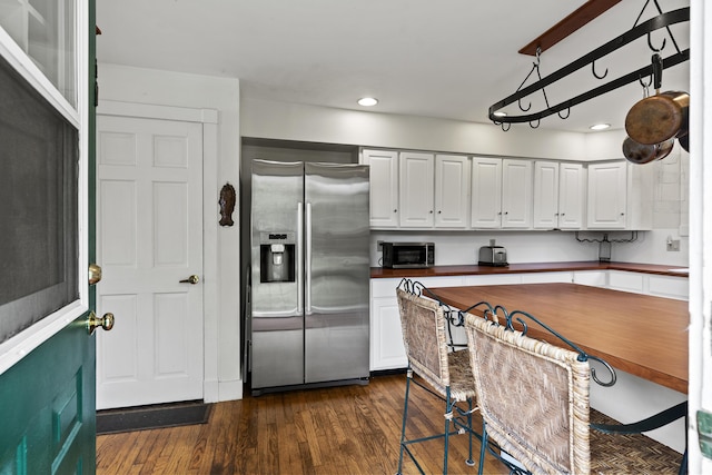 28 Will Alley Rd, South Bristol, ME 04568 - kitchen featuring appliances with stainless steel finishes, dark wood finished floors, white cabinets, and recessed lighting
