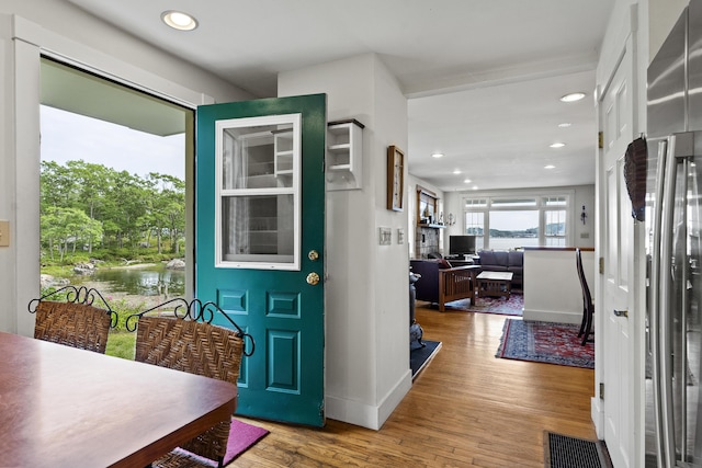 28 Will Alley Rd, South Bristol, ME 04568 - foyer entrance with wood finished floors, recessed lighting, and a water view