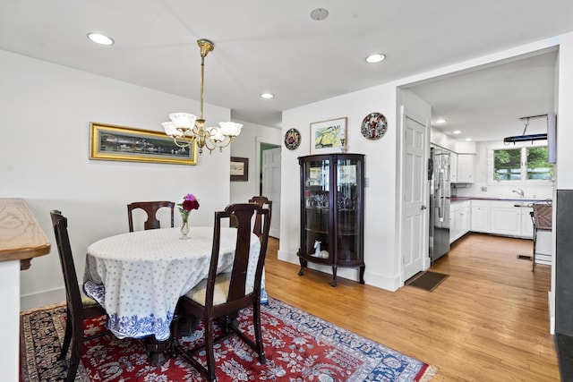 28 Will Alley Rd, South Bristol, ME 04568 - dining room featuring light wood-type flooring, a chandelier, and recessed lighting