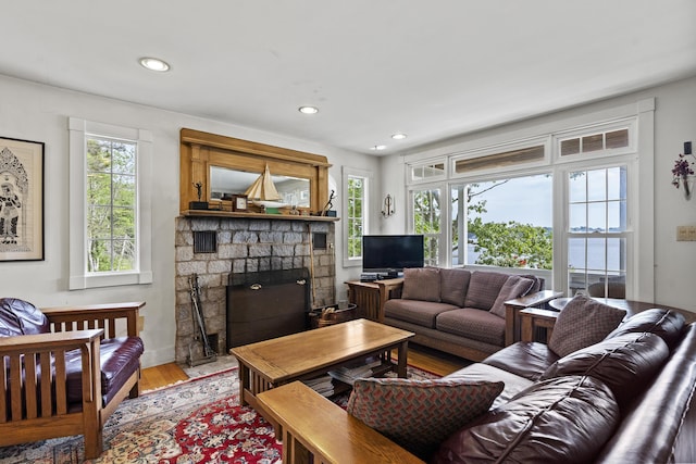 28 Will Alley Rd, South Bristol, ME 04568 - living room featuring light wood-type flooring, a fireplace with flush hearth, and recessed lighting