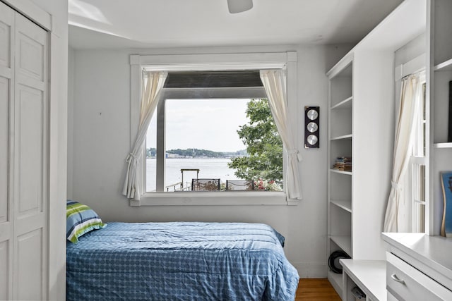 28 Will Alley Rd, South Bristol, ME 04568 - bedroom with wood finished floors and a water view