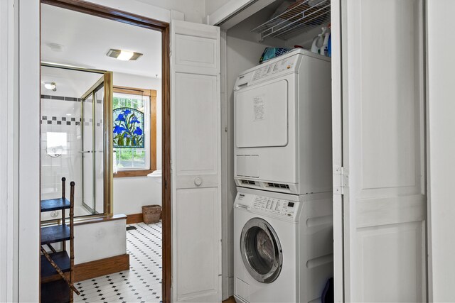28 Will Alley Rd, South Bristol, ME 04568 - laundry room with stacked washing machine and dryer and tile patterned floors