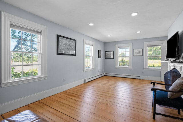253 Quaker Meeting House Rd, Durham, ME 04222 - unfurnished room with light wood-style flooring, recessed lighting, and a baseboard radiator