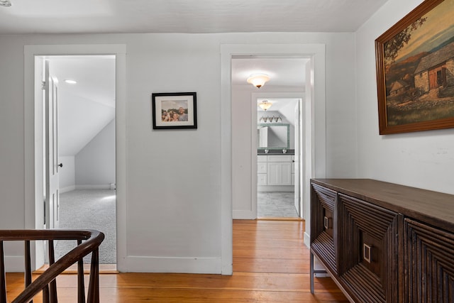 253 Quaker Meeting House Rd, Durham, ME 04222 - hallway featuring light wood-style floors and baseboards