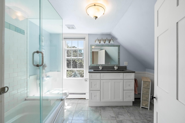 253 Quaker Meeting House Rd, Durham, ME 04222 - full bathroom with a baseboard heating unit, vanity, vaulted ceiling, and bath / shower combo with glass door