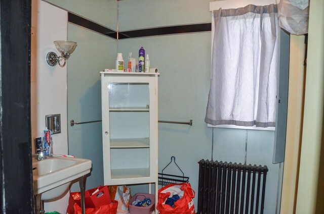 40 Chapel St, Augusta, ME 04330 - bathroom featuring radiator and a sink